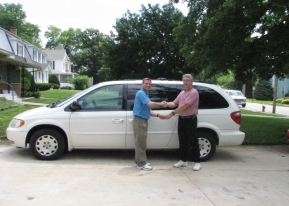Jeff Bush receiving 2002 Chrysler van
